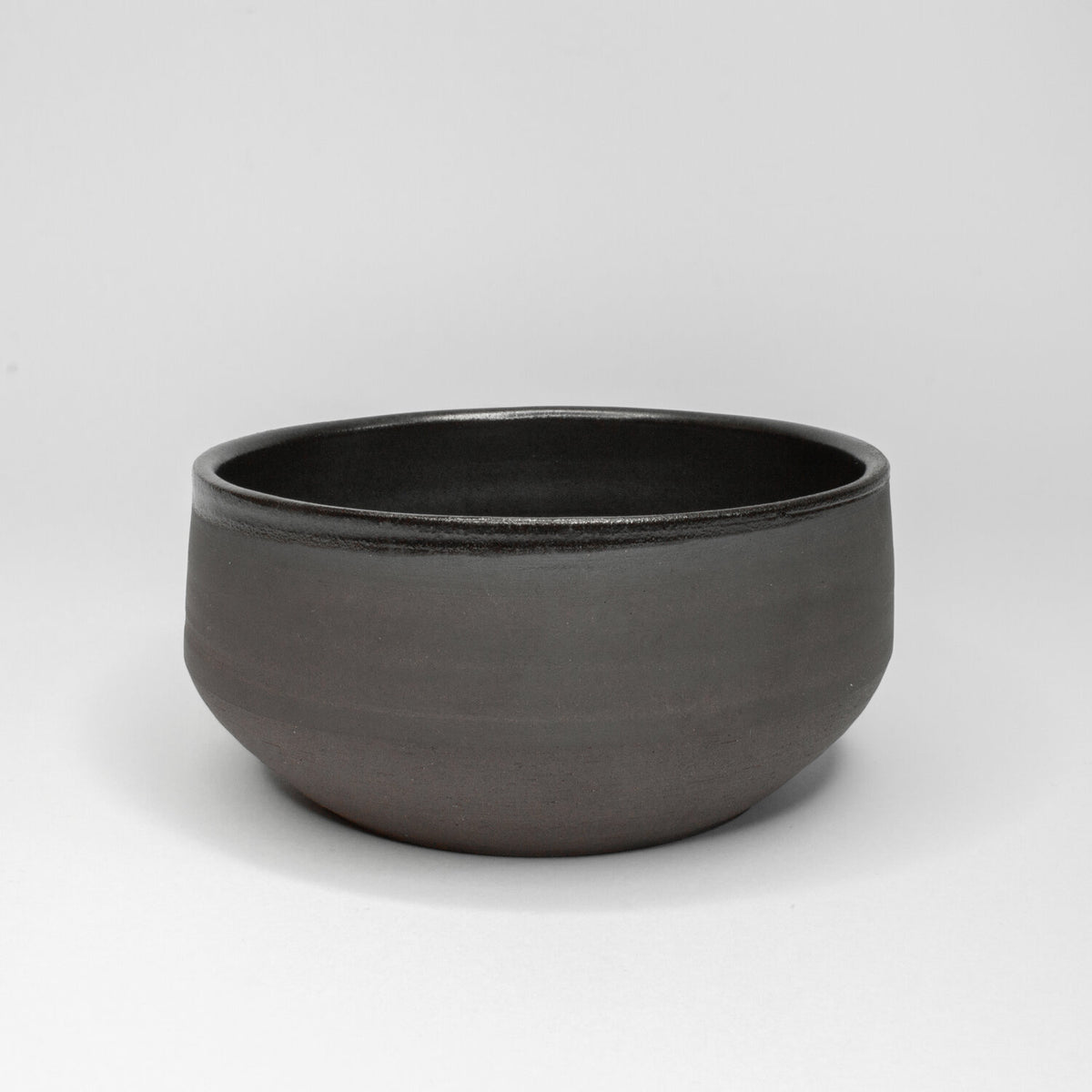 Handmade stoneware bowl glazed matte black ker