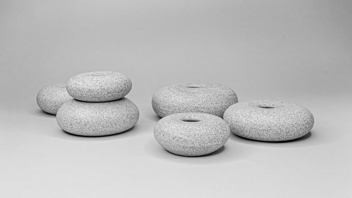 Handthrown porcelain candleholders made with volcanic ash ker
